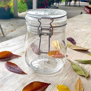 Hand etched sealed glass jar